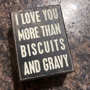 “ I love you more than biscuits and gravy” sign